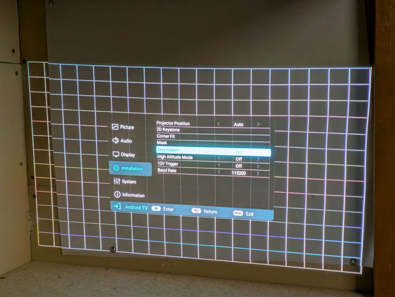 Grid test pattern projected to check panel uniformity and dead pixels