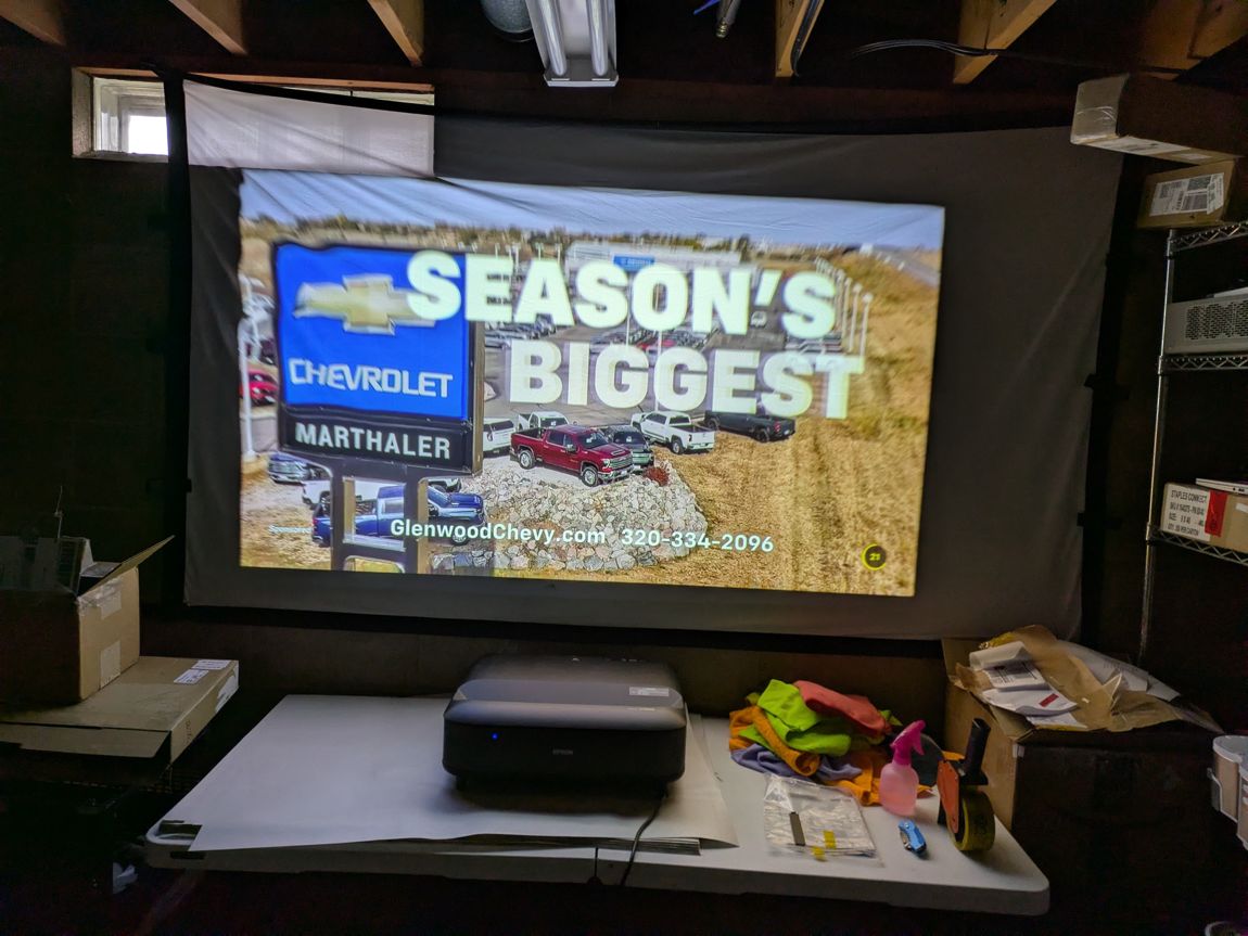 LS650 powered on and projecting full-color content on a screen